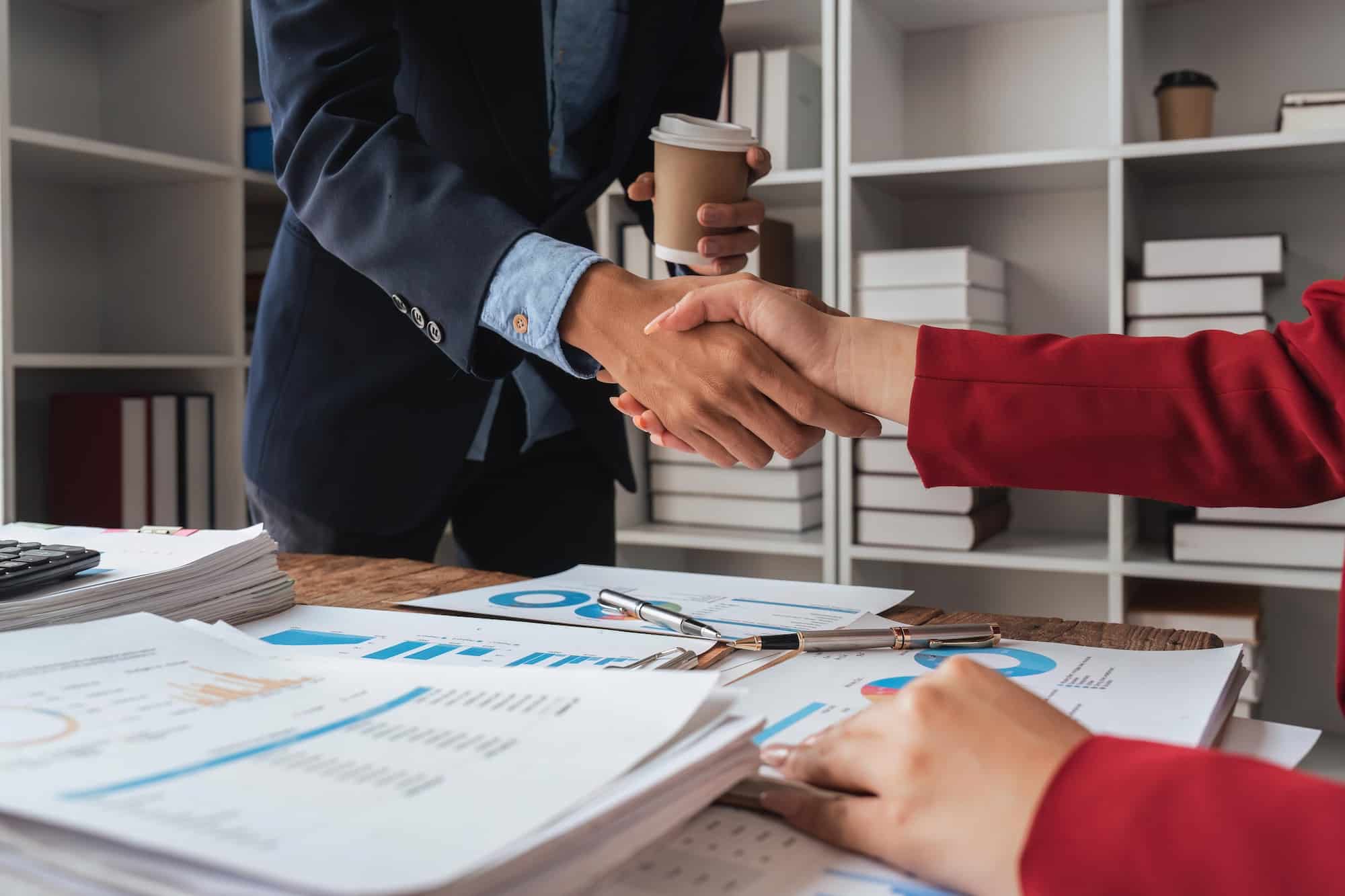 businessman handshake. successful businessmen handshaking after good deal. business partnership